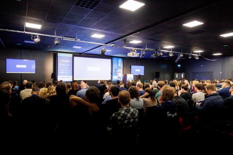 Gus Pelogia speaking at a conference